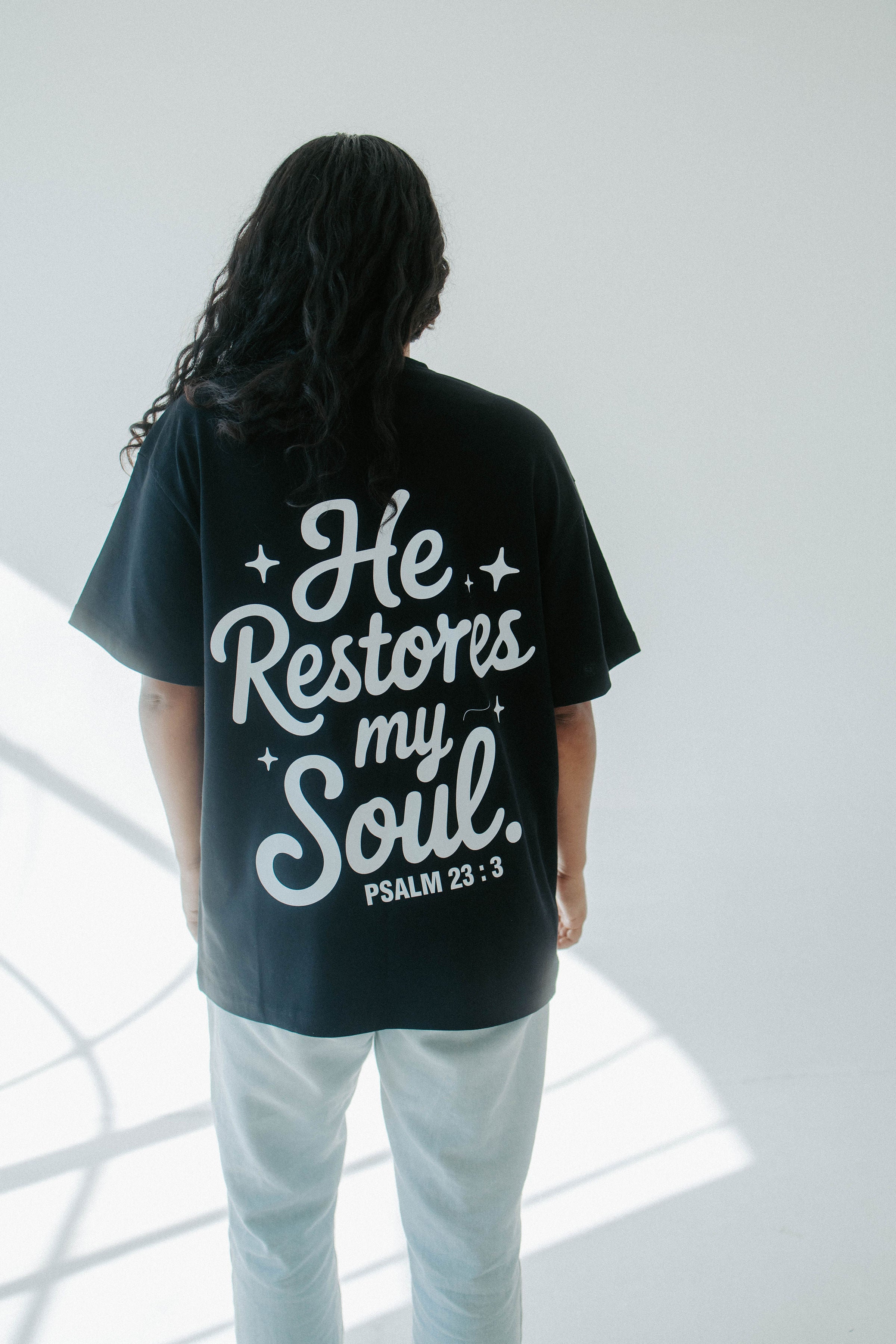 HE RESTORES MY SOUL TEE IN BLACK
