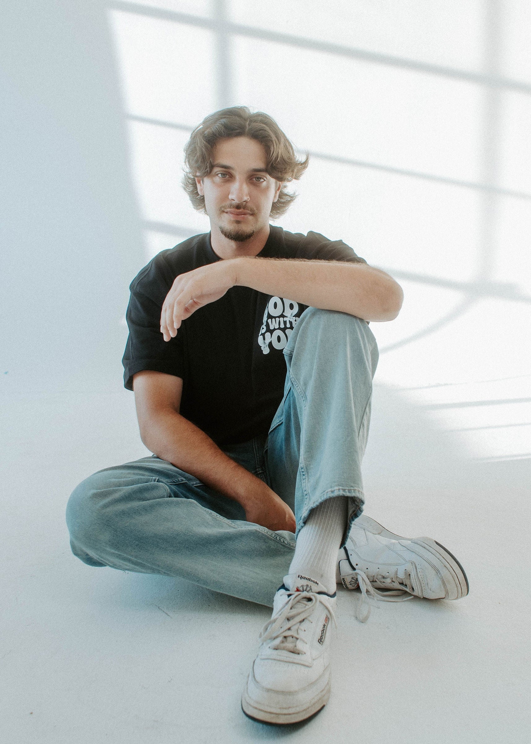 GOD IS WITH YOU TEE IN BLACK