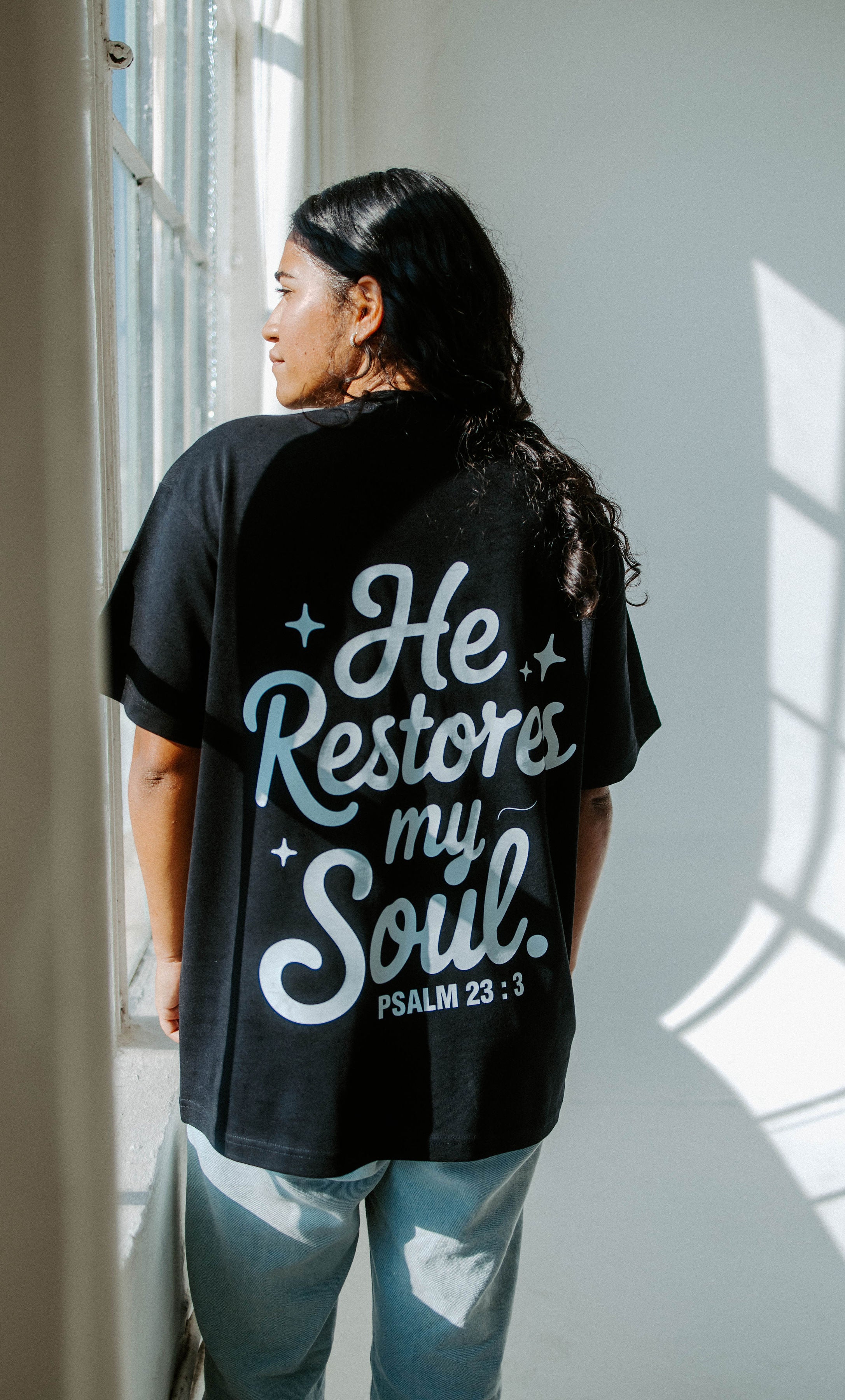 HE RESTORES MY SOUL TEE IN BLACK