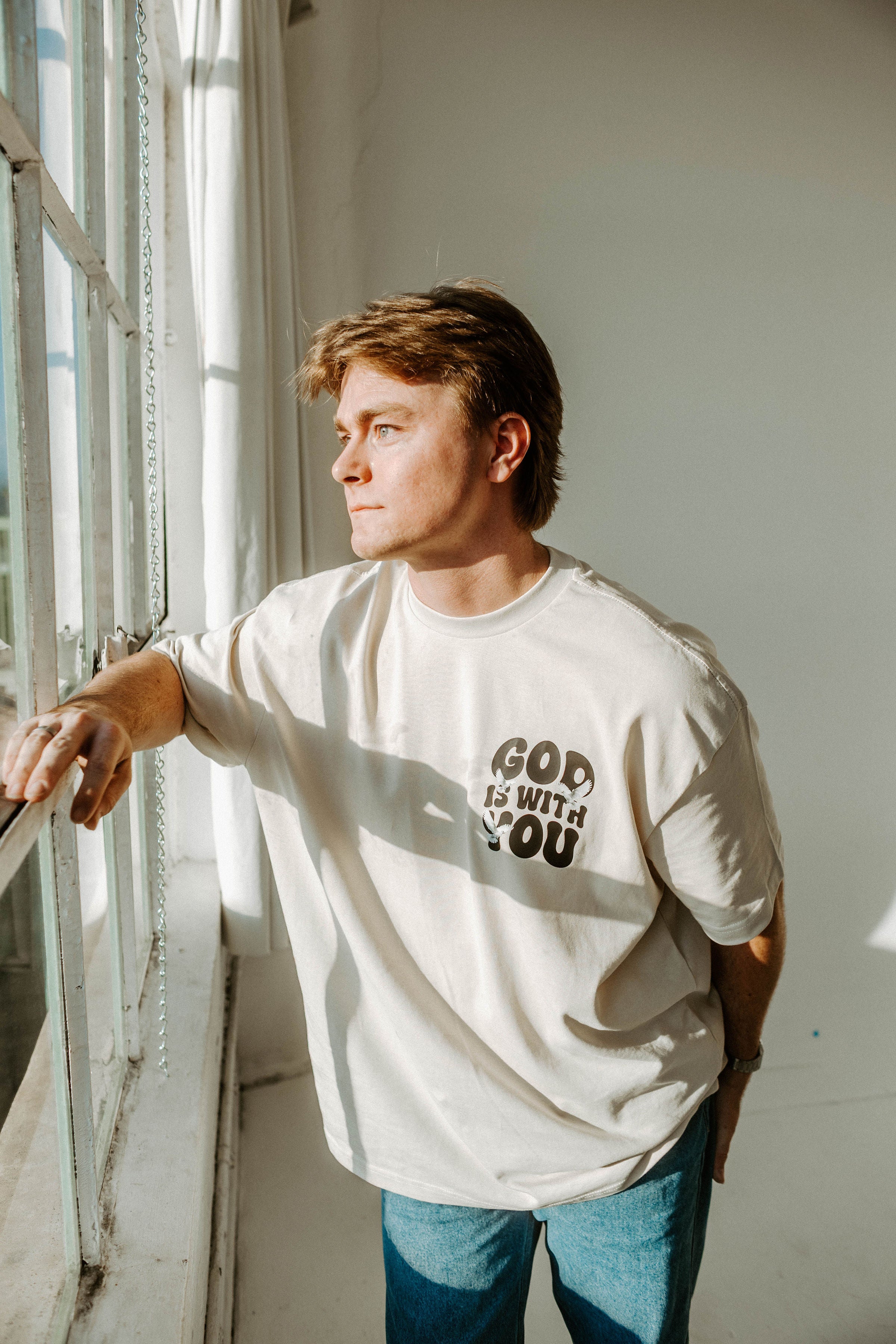 GOD IS WITH YOU TEE IN BEIGE