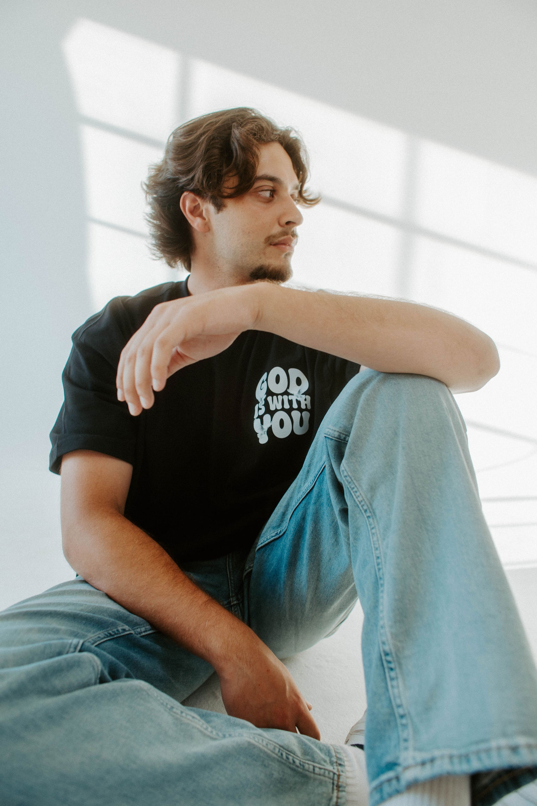 GOD IS WITH YOU TEE IN BLACK