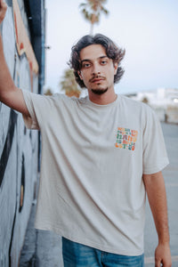 WHEN GOD HOLDS YOUR HAND TEE IN BEIGE