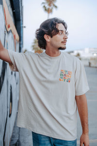 WHEN GOD HOLDS YOUR HAND TEE IN BEIGE