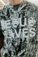 Camouflage shirt with 'Jesus Saves' text