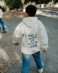 Close-up of the “What a Friend We Have in Jesus” design on a Christian children’s hoodie.