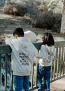 Back view of kids hoodie featuring the hymn-inspired message “What a Friend We Have in Jesus.”