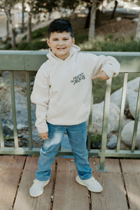 Close-up of the “What a Friend We Have in Jesus” design on a Christian children’s hoodie.