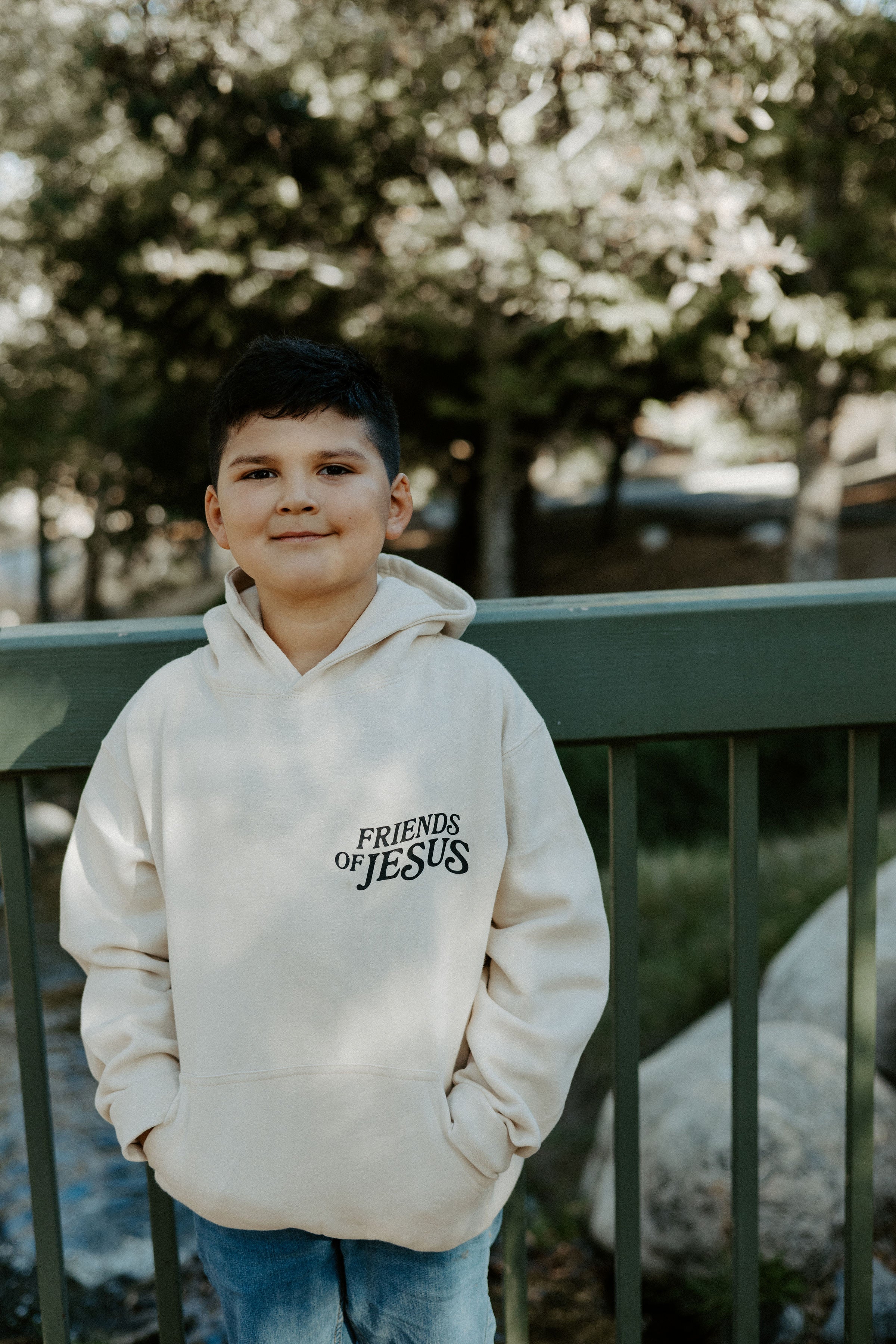 Front of beige Christian kids hoodie designed for soft comfort and everyday wear.