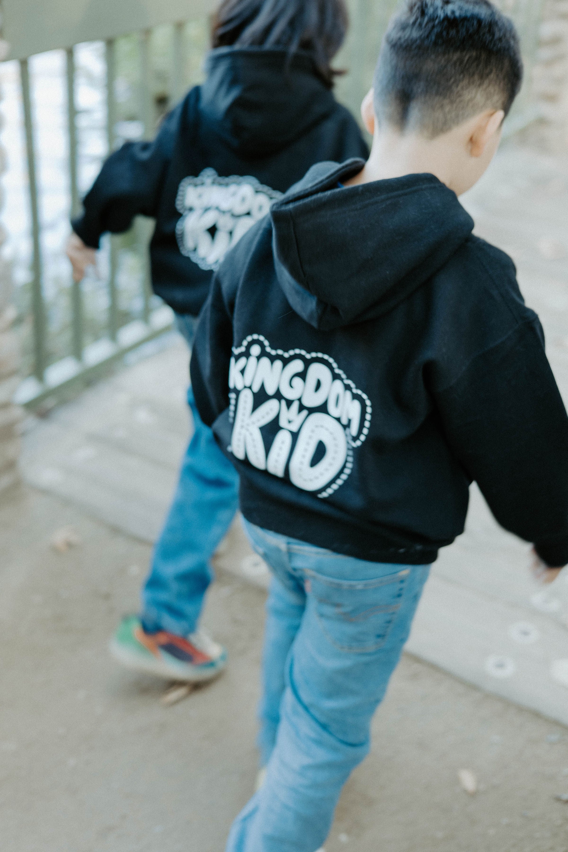 Close-up of the “Kingdom Kid” Christian design on a kids hoodie.