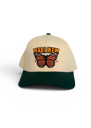 Beige and green cap with butterfly design and text on a white background