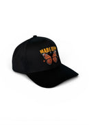 Black cap with 'MADE HERE' and butterfly design on a white background