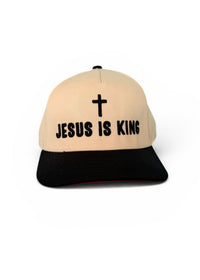 Beige and black cap with 'Jesus is King' text and cross on a white background