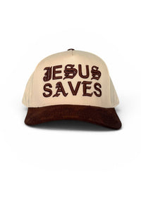 Beige cap with 'Jesus Saves' text on a white background