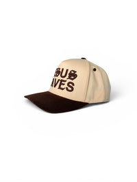 Beige and brown cap with text on a white background