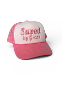 Pink and white cap with 'Saved by Grace' text on a white background